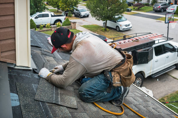 Professional Roofing technician working in Westbury, NY